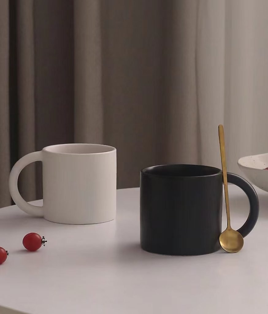 Custom printed coffee mugs branded with a company logo