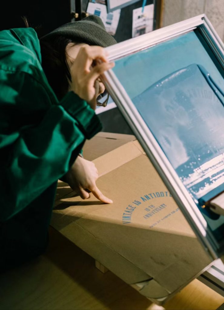 Stack of regular flat-printed posters and promotional materials
