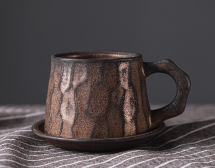 ceramic mug suited for hot beverages like coffee and tea
