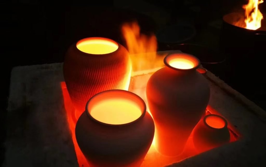 Collection of ceramic mugs highlighting varied firing craftsmanship