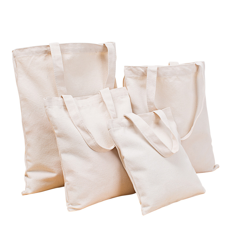 canvas tote bag with visible interior compartments for organizing items