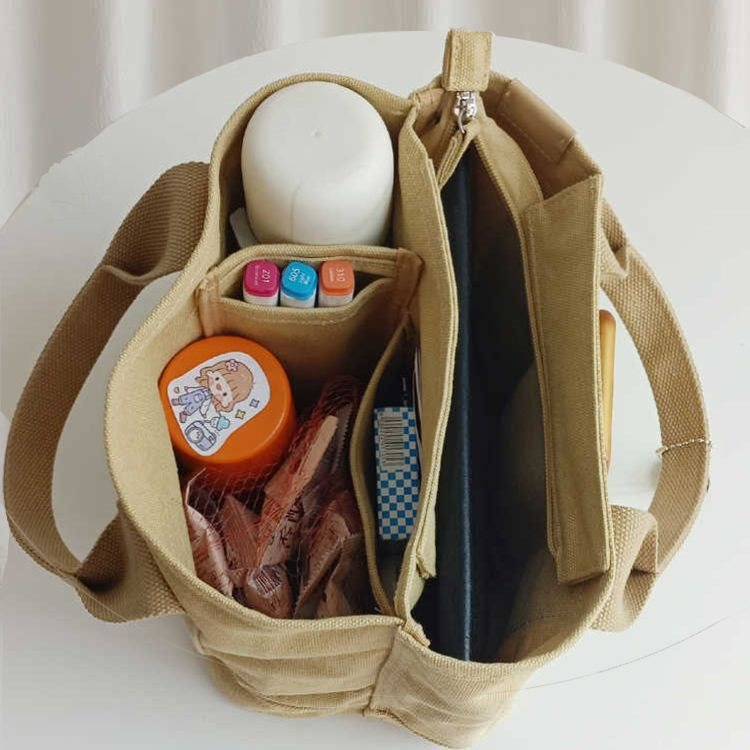 canvas tote bag with sturdy carrying handles and straps