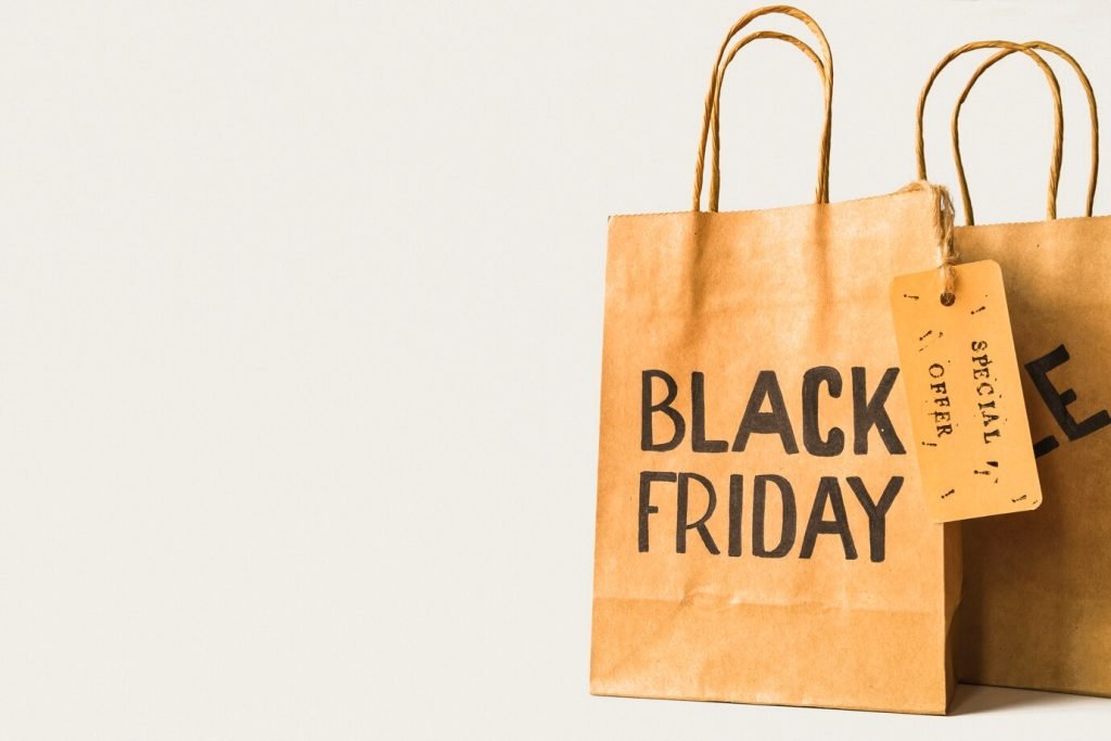 Brown paper shopping bags with a sale tag attached