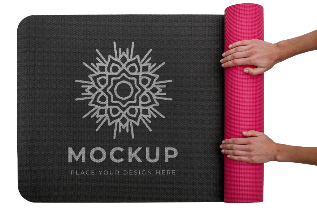 Close-up of hands rolling up a yoga mat
