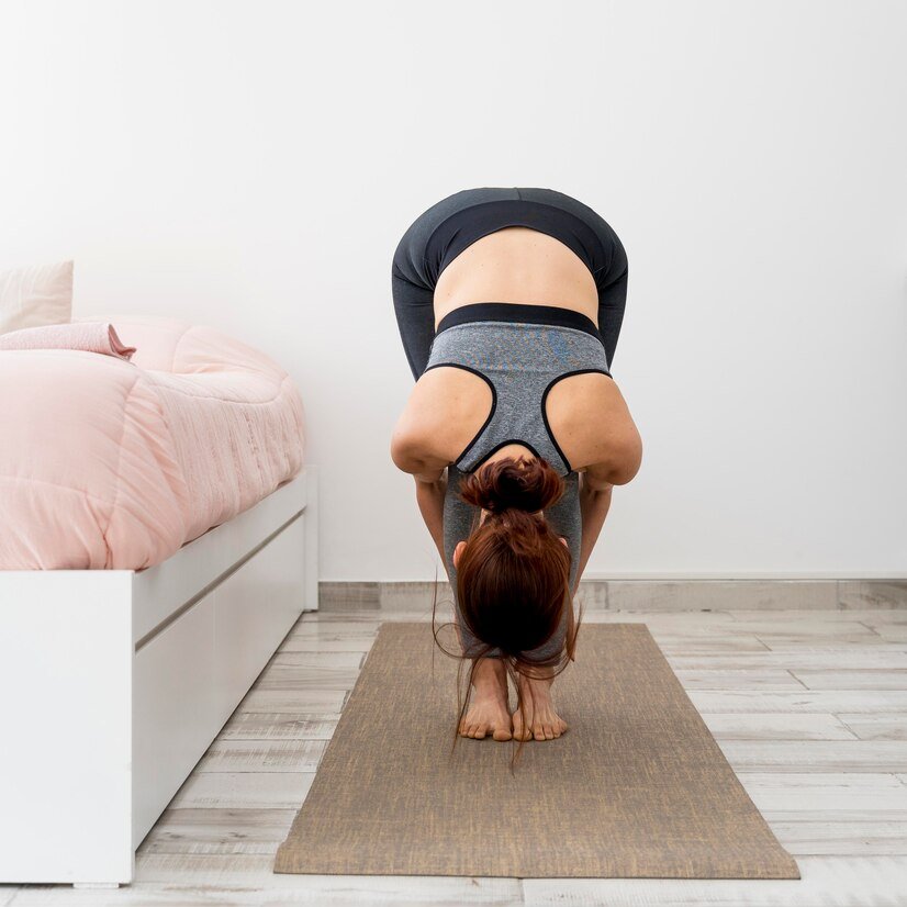 Woman stretching on a colorful custom-designed yoga mat