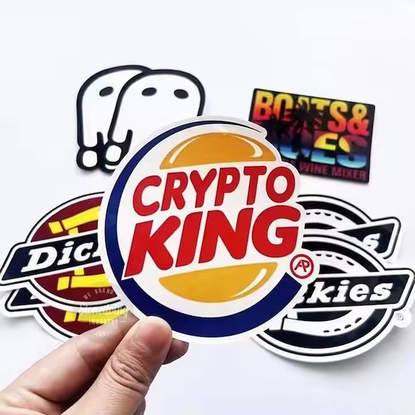 Collection of stickers including a bold "Crypto King" design