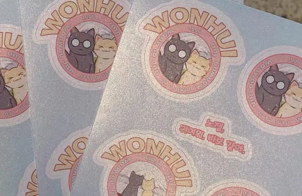 Glitter sticker sparkling on festive party packaging