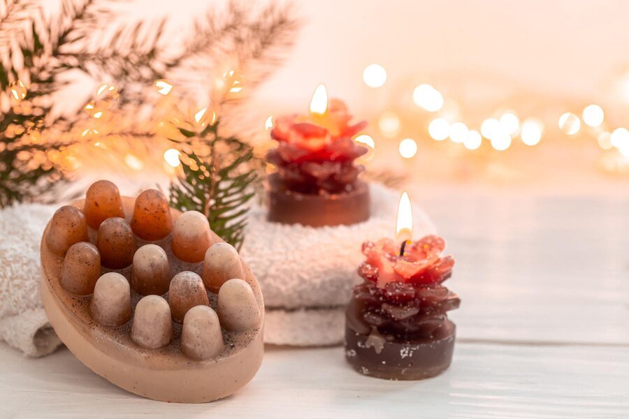 Spa-style arrangement with incense sticks and fragrant soap