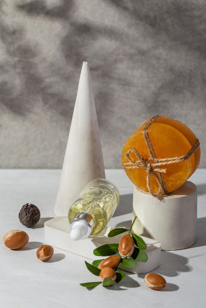 natural oil bottles arranged for blending candle fragrances