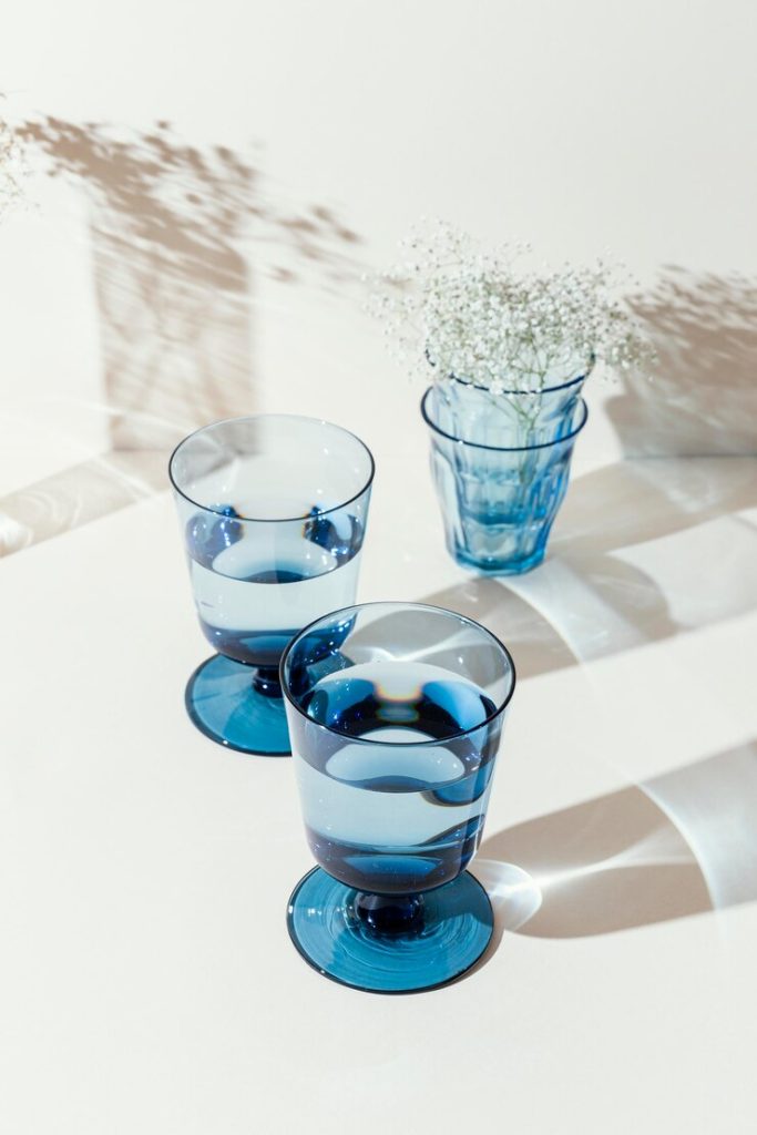 finished glass cups filled with water after quality inspection