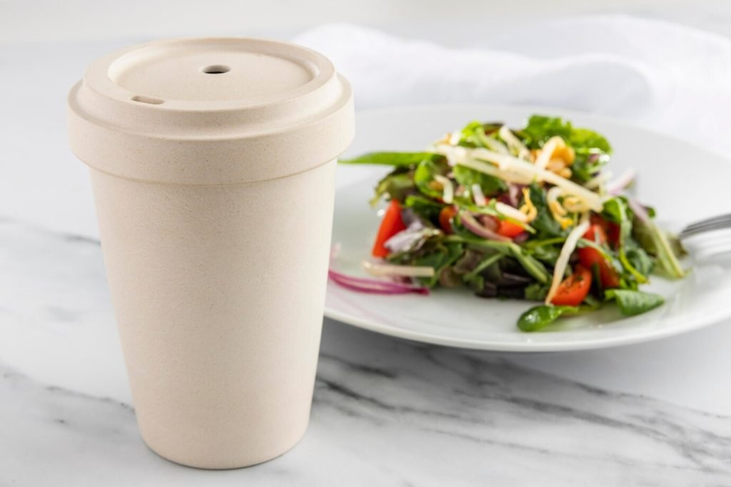 Healthy salad served in biodegradable food packaging
