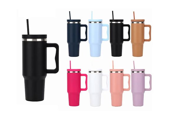 Colorful insulated tumblers with straws in various colors