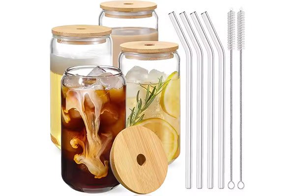 Glass jars with bamboo lids, glass straws, and cleaning brushes