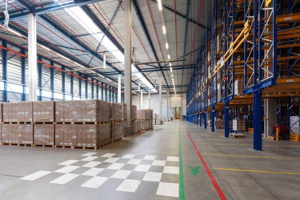 Warehouse stocked with shelves of inventory and goods