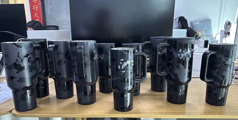 Printed pre-production tumbler samples ready for supplier review