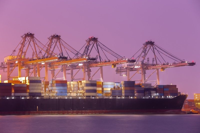 Container ship transporting cargo via ocean freight